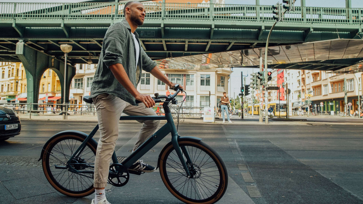 guy on amsterdam ebike on the streets in Berlin guy on amsterdam ebike on the streets in Berlin